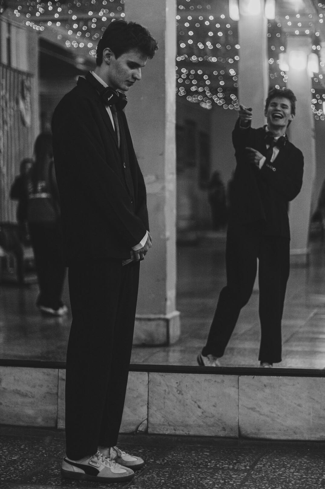 person practicing speech in front of mirror
