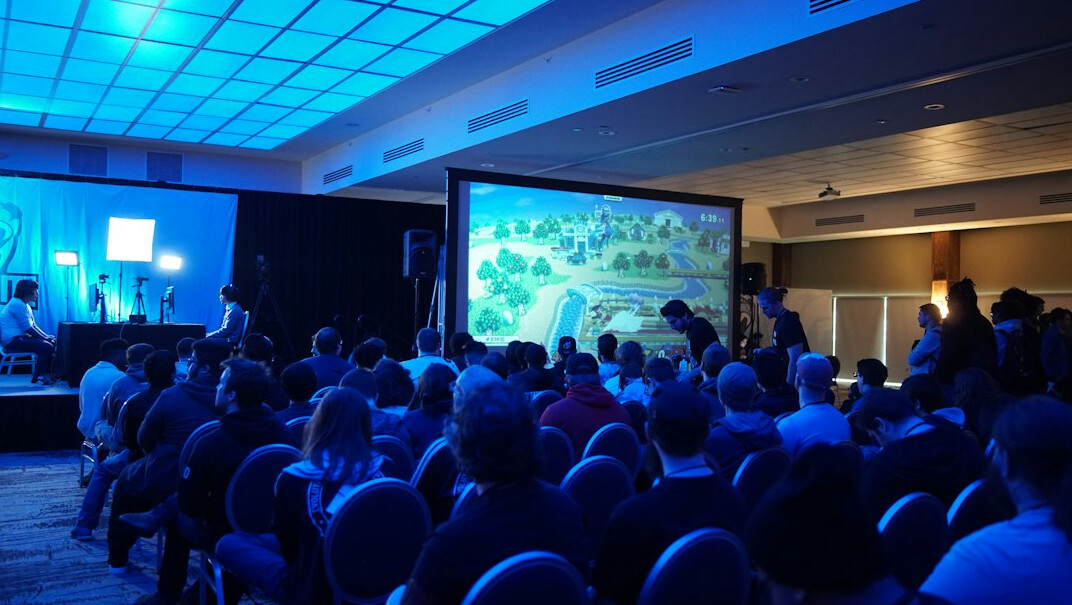 person giving presentation on stage